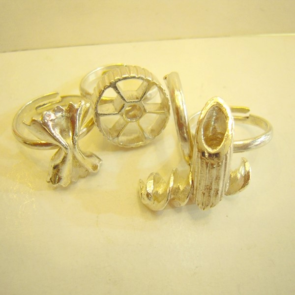 Anelli in argento 925/000 a forma di pasta : farfalle,mezze penne,ruote, fusilli .
